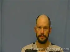 Mugshot of JUSTIN WOLFE booked in Saline County, Arkansas on March 16, 2026