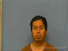 Mugshot of CEASAR AGUSTO booked in Saline County, Arkansas on March 21, 2026