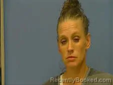 Mugshot of GENNIE CARTER booked in Saline County, Arkansas on May 7, 2026
