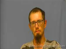 Mugshot of JUSTIN LEWIS booked in Saline County, Arkansas on July 2, 2026