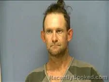 Mugshot of Justin Abbott booked in Saline County, Arkansas on October 18, 2026
