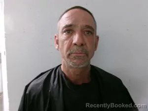 Mugshot of Johnny Evans Weikle