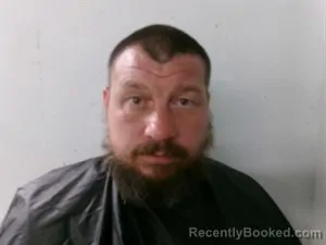 Mugshot of Travis Eugene Dority booked in Searcy County, Arkansas on April 22, 2026