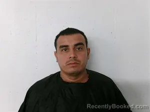 Mugshot of Carlos Alejandro Chinchilla Palencia booked in Searcy County, Arkansas on October 14, 2026