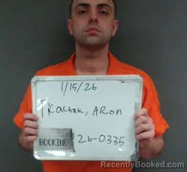 Mugshot of ARON RYAN TREY TKACHAK