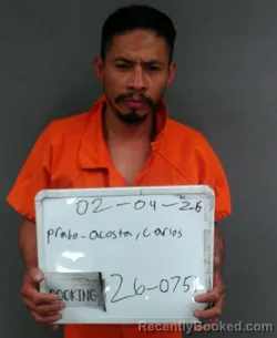 Mugshot of Carlos Prado-Acosta