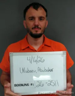 Mugshot of Abubakar Ulubaev booked in Sebastian County, Arkansas on April 16, 2026