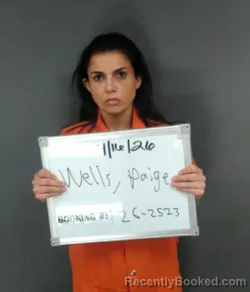 Mugshot of Paige Marie Wells booked in Sebastian County, Arkansas on April 16, 2026