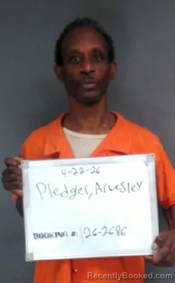 Mugshot of Arwesley Charles Junior Pledger booked in Sebastian County, Arkansas on April 22, 2026