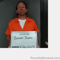 Mugshot of Justin Scott Brown booked in Sebastian County, Arkansas on April 22, 2026