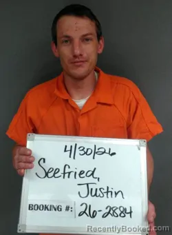 Mugshot of Justin Tyler Seefried booked in Sebastian County, Arkansas on April 30, 2026