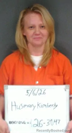 Mugshot of Kimberly Leann Husman booked in Sebastian County, Arkansas on May 6, 2026