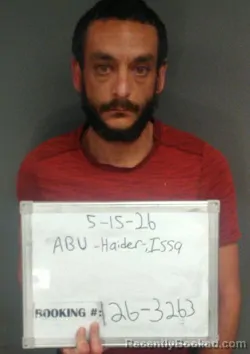 Mugshot of Issa Matthew Abu-Haider booked in Sebastian County, Arkansas on May 14, 2026