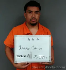 Mugshot of Carlos Omar Araujo-Garcia booked in Sebastian County, Arkansas on June 16, 2026