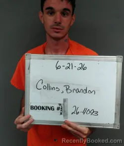 Mugshot of Brandon Kaleb Collins booked in Sebastian County, Arkansas on June 21, 2026