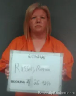 Mugshot of Regina B. Russell booked in Sebastian County, Arkansas on June 27, 2026