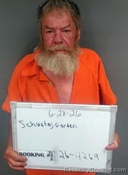 Mugshot of Gordon Anthony Schuster booked in Sebastian County, Arkansas on June 27, 2026
