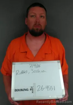 Mugshot of Joshua David Riddell booked in Sebastian County, Arkansas on July 9, 2026