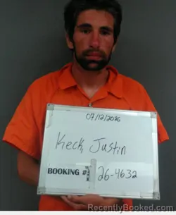 Mugshot of Justin Westley Keck booked in Sebastian County, Arkansas on July 12, 2026