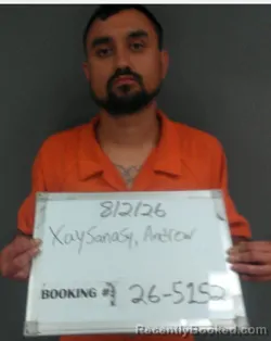 Mugshot of Andrew Somdis Xaysanasy booked in Sebastian County, Arkansas on August 1, 2026