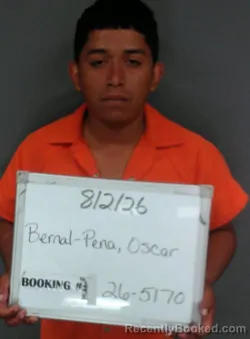 Mugshot of Oscar Bernal-Pena booked in Sebastian County, Arkansas on August 2, 2026