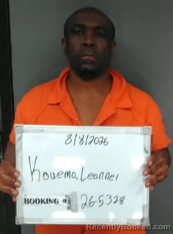 Mugshot of Leonnel Kouemo booked in Sebastian County, Arkansas on August 8, 2026