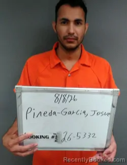 Mugshot of Josue Milton Pineda-Garcia booked in Sebastian County, Arkansas on August 8, 2026