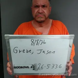 Mugshot of Jason William Grebe booked in Sebastian County, Arkansas on August 8, 2026