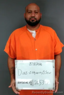 Mugshot of Oscar Diaz-Zequeira booked in Sebastian County, Arkansas on August 8, 2026