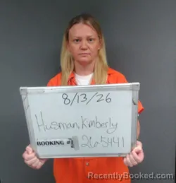 Mugshot of Kimberly Leann Husman booked in Sebastian County, Arkansas on August 13, 2026