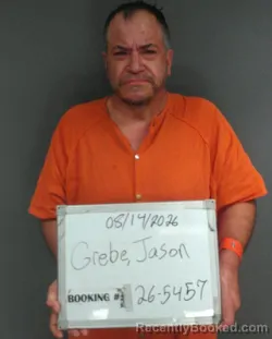 Mugshot of Jason William Grebe booked in Sebastian County, Arkansas on August 13, 2026