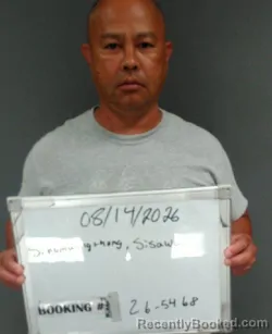 Mugshot of Sisawat Si Singmuongthong booked in Sebastian County, Arkansas on August 14, 2026