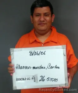 Mugshot of Carlos Alarcon-Mendez booked in Sebastian County, Arkansas on August 16, 2026
