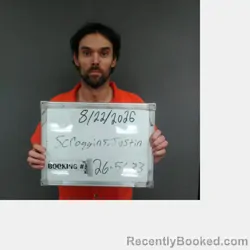 Mugshot of Justin Lee Scroggins booked in Sebastian County, Arkansas on August 22, 2026