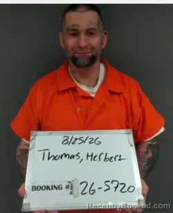Mugshot of Herbert Allen Thomas booked in Sebastian County, Arkansas on August 25, 2026