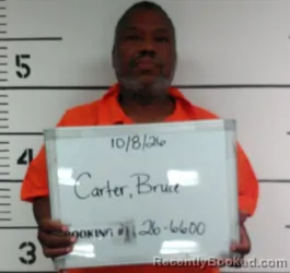 Mugshot of Bruce Douglas Carter booked in Sebastian County, Arkansas on October 8, 2026