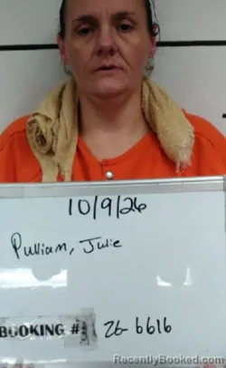 Mugshot of Julie Diane Pulliam booked in Sebastian County, Arkansas on October 9, 2026