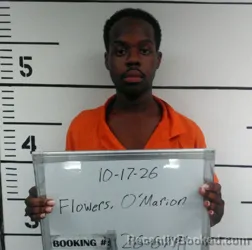 Mugshot of O'Marion Javon Flowers booked in Sebastian County, Arkansas on October 17, 2026