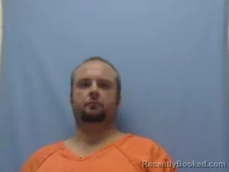 Mugshot of MICHAEL POUNDS