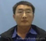 Mugshot of Gan Zhao booked in Sevier County, Arkansas on October 21, 2026