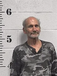 Mugshot of Russell Mccombs Huntsman booked in Sharp County, Arkansas on April 8, 2026