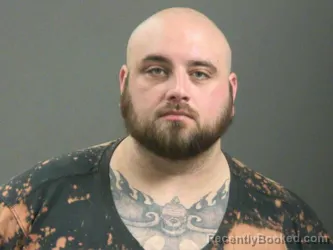 Mugshot of Aaron Rhodes