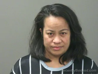 Mugshot of Justina Lobju