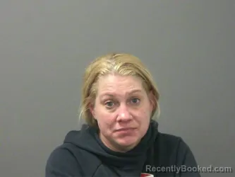 Mugshot of Ashley Knotts booked in Washington County, Arkansas on March 11, 2026