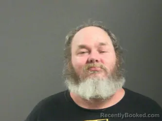 Mugshot of Jason Swim booked in Washington County, Arkansas on March 12, 2026