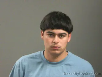 Mugshot of Miguel Mora booked in Washington County, Arkansas on March 13, 2026