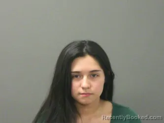 Mugshot of Esperanza Reed booked in Washington County, Arkansas on March 14, 2026