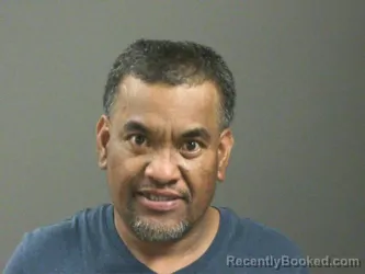 Mugshot of Junior Piti booked in Washington County, Arkansas on March 14, 2026