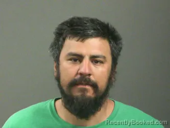 Mugshot of Carlos Lara-Jacobo booked in Washington County, Arkansas on March 14, 2026