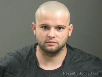 Mugshot of Cooper Carter booked in Washington County, Arkansas on March 15, 2026